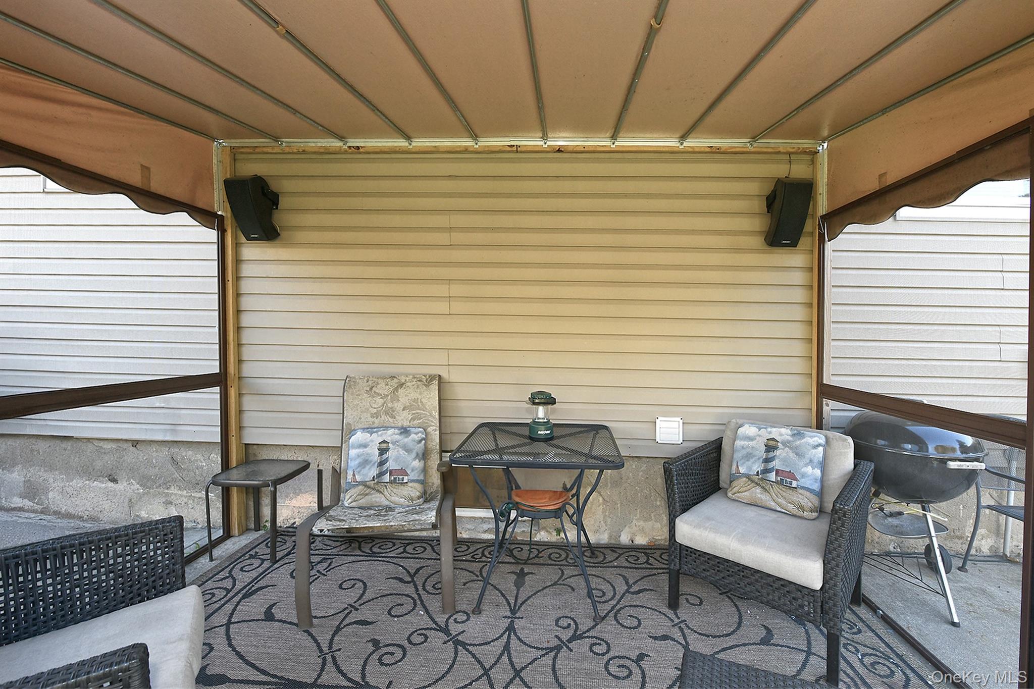 115 Old Farmingdale Road West Babylon, NY 11704 - Photo 30 of 30 a view of a patio with couple of chairs and a potted plant