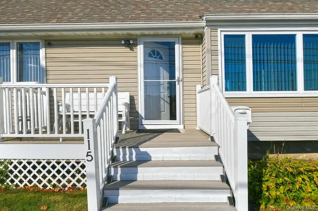 a front view of a house with a porch