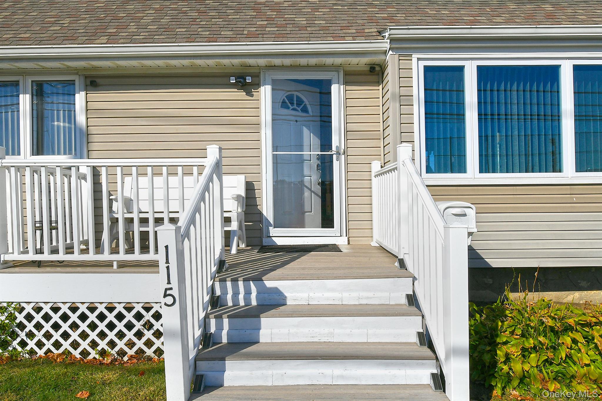 115 Old Farmingdale Road West Babylon, NY 11704 - Photo 5 of 30 a front view of a house with a porch