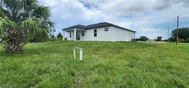 a house view with a garden space