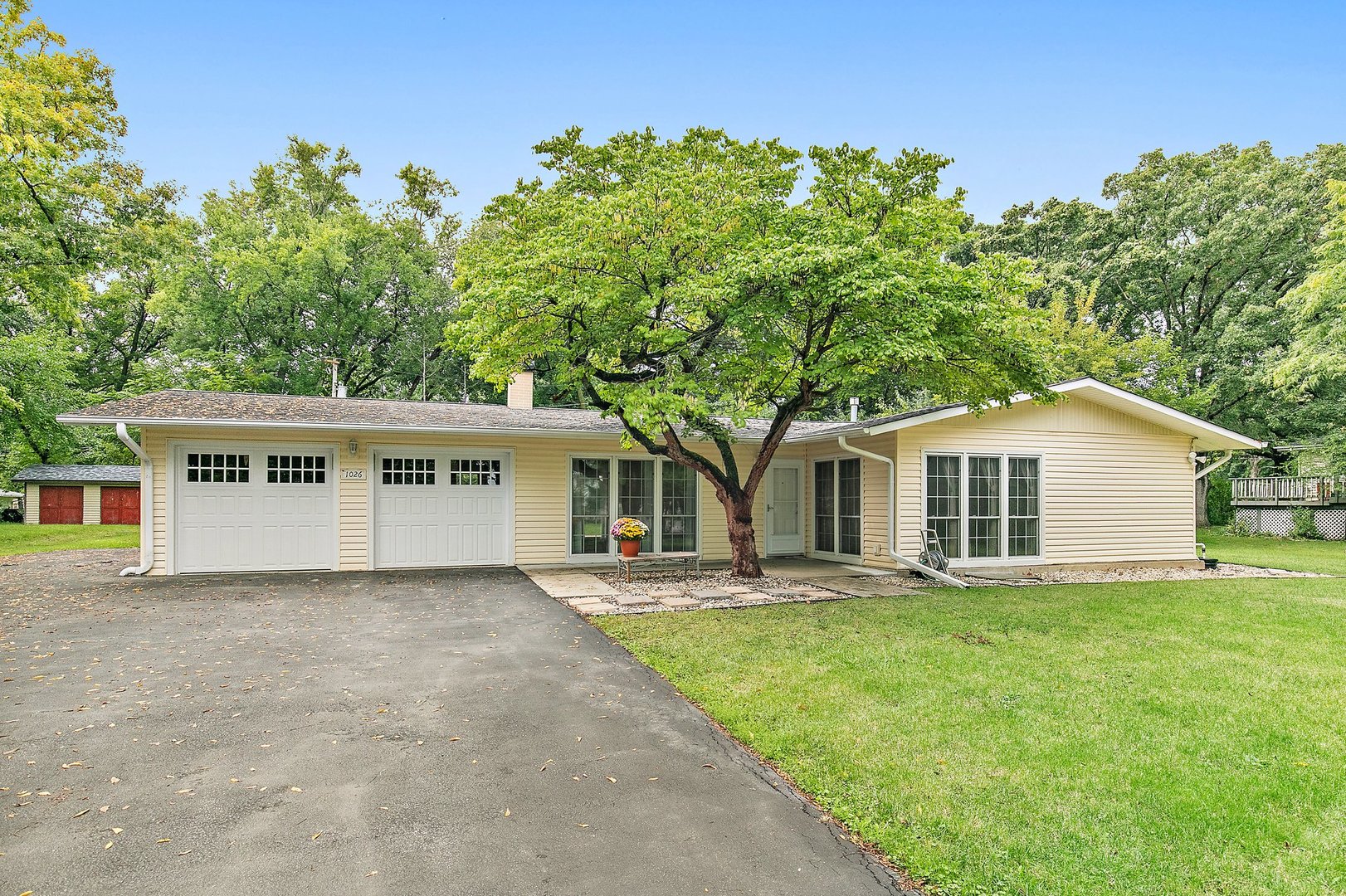 1026 Oak Ridge Road Carpentersville, IL 60110 - Photo 1 of 25 front view of a house with a yard