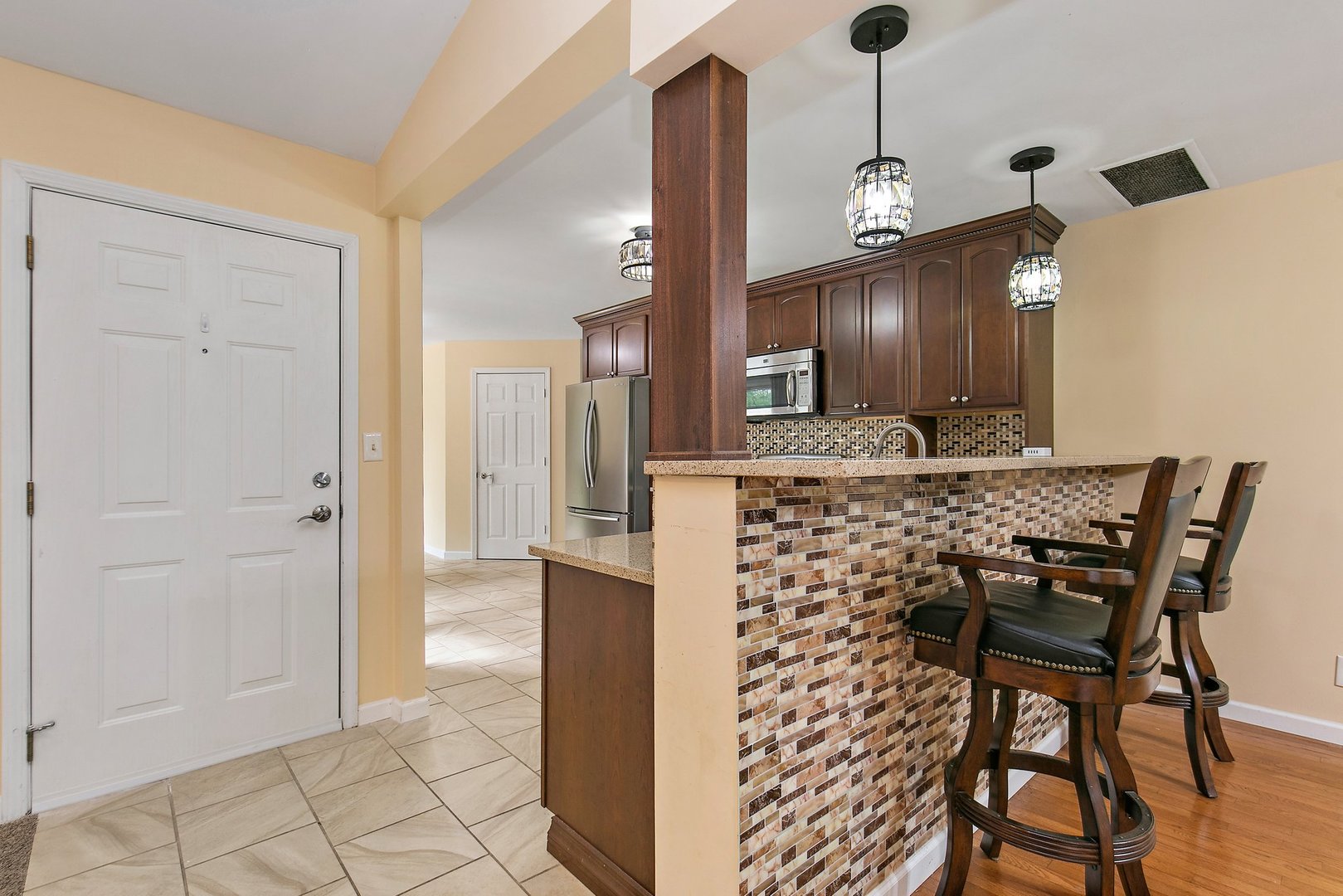 1026 Oak Ridge Road Carpentersville, IL 60110 - Photo 11 of 25 a view of a kitchen with dining table and chairs