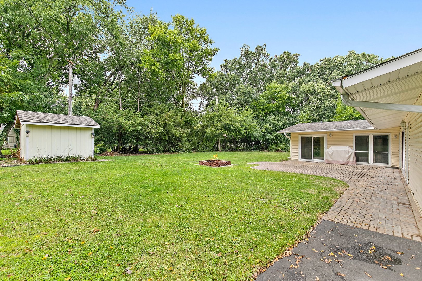 1026 Oak Ridge Road Carpentersville, IL 60110 - Photo 22 of 25 a front view of house with yard and green space