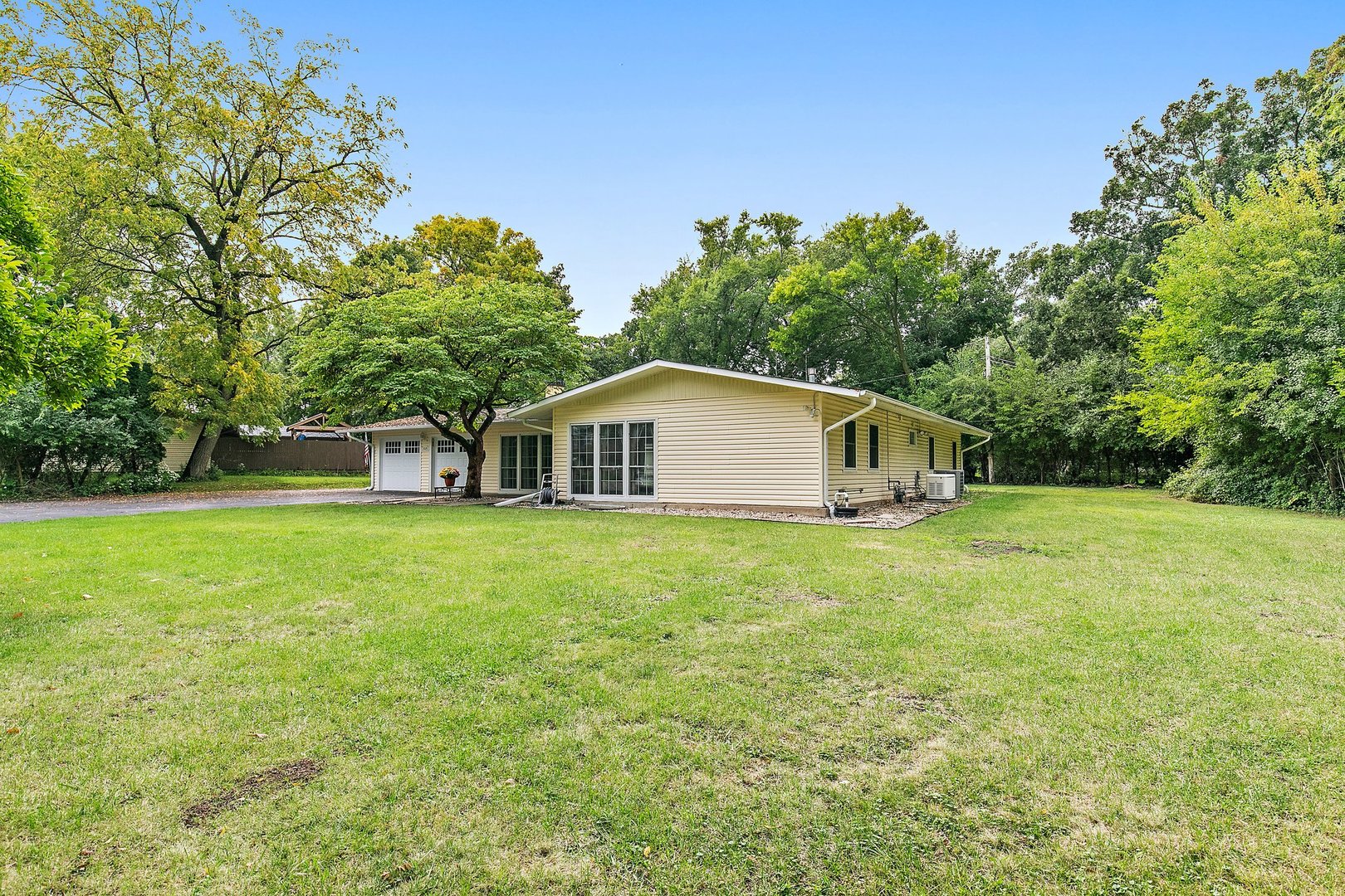 1026 Oak Ridge Road Carpentersville, IL 60110 - Photo 25 of 25 a front view of house with yard and trees