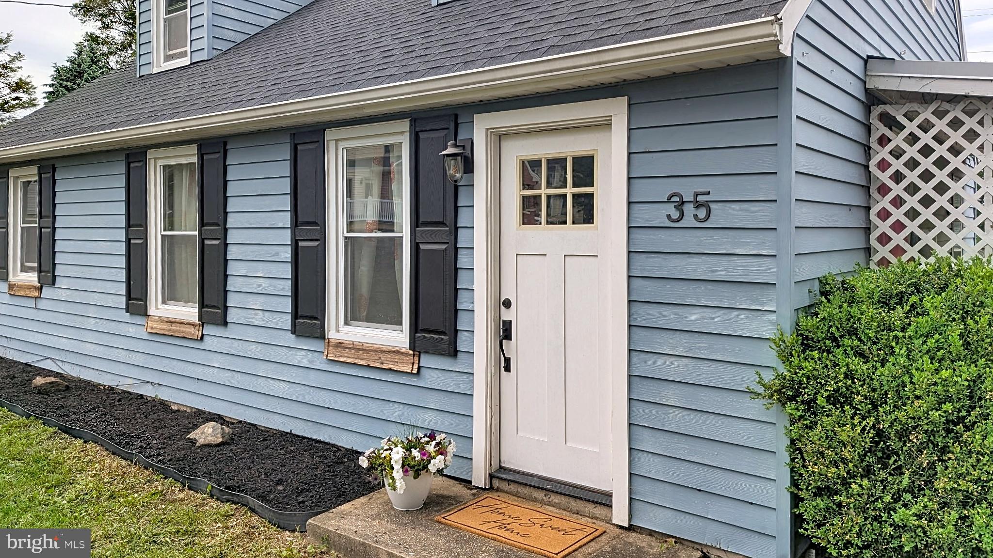 35 West Main Street Salunga, PA 17538 - Photo 13 of 14 Charming blue home with inviting entry.