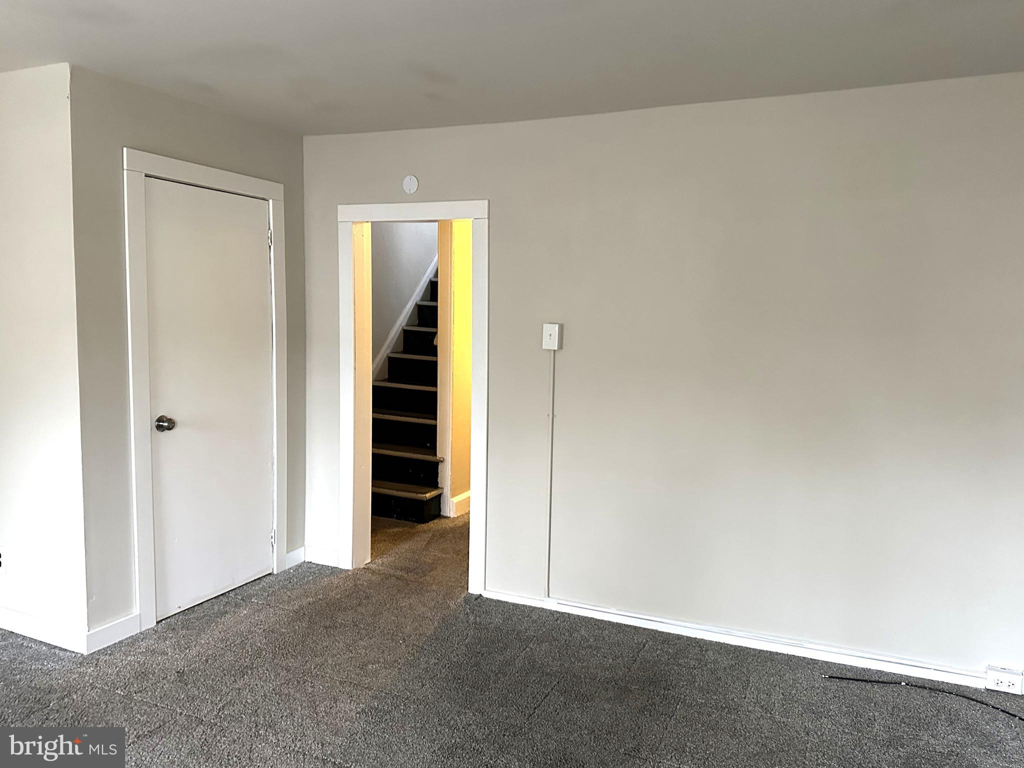 425 Highland Avenue, Unit B Chester, PA 19013 - Photo 12 of 25 wooden floor in an empty room