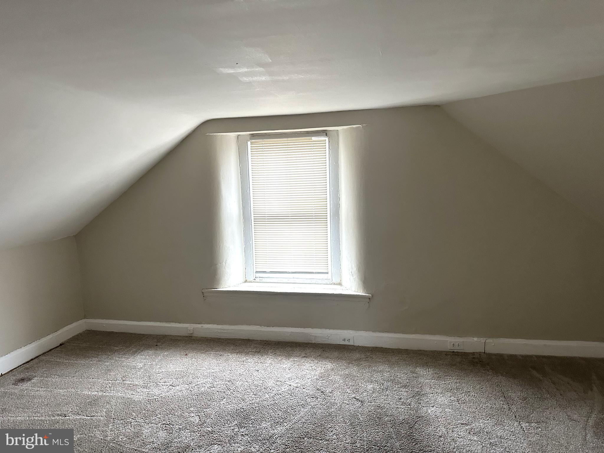 425 Highland Avenue, Unit B Chester, PA 19013 - Photo 20 of 25 an empty room with a window