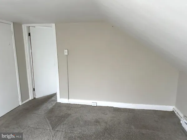 an empty room with a workbench