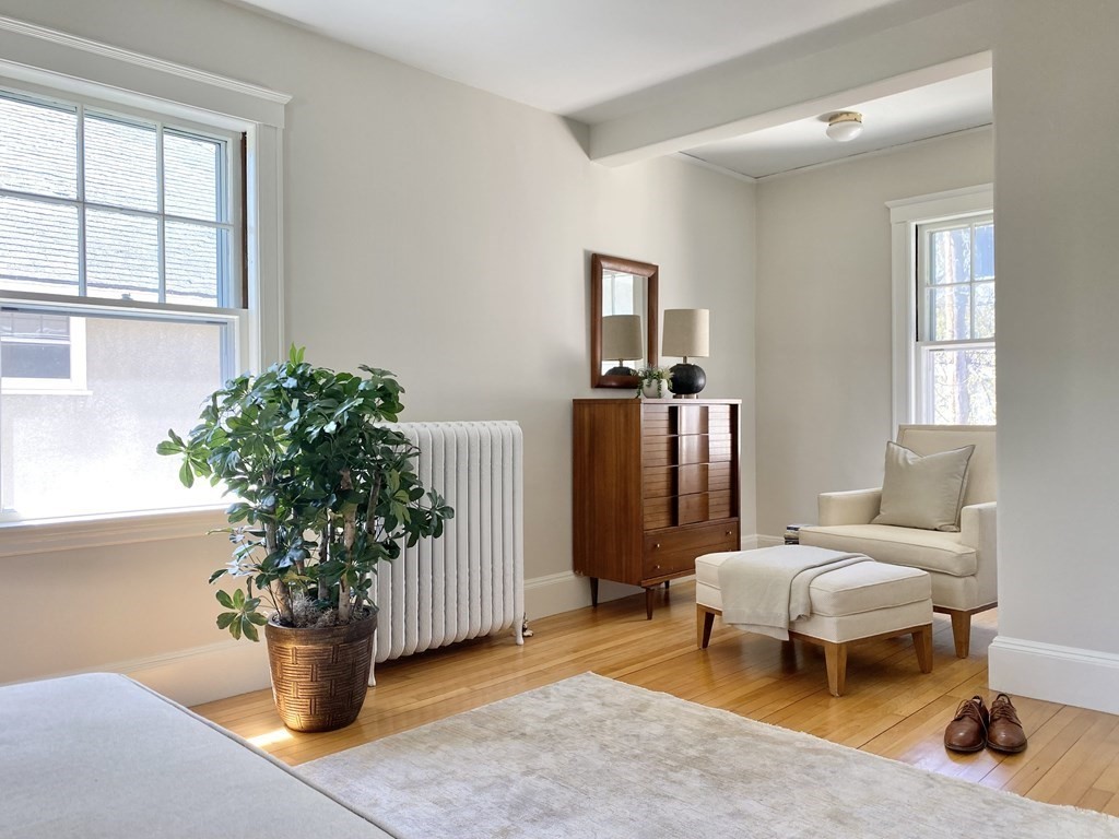 76 Prince Street Boston, MA 02130 - Photo 15 of 23 a living room with furniture and a potted plant