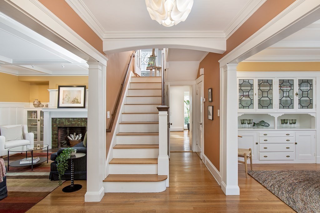 76 Prince Street Boston, MA 02130 - Photo 5 of 23 a view of front door with hallway and wooden floor