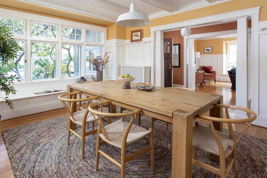 76 Prince Street Boston, MA 02130 - Photo 6 of 23 a dining room with a table and chairs