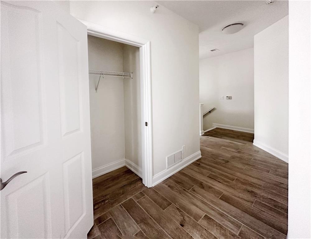 228 Adams Pointe Boulevard, Unit 7 Mars, PA 16046 - Photo 2 of 27 a view of a bathroom with wooden floor