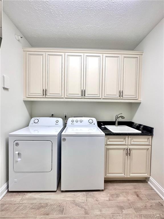 228 Adams Pointe Boulevard, Unit 7 Mars, PA 16046 - Photo 23 of 27 a utility room with washer and dryer