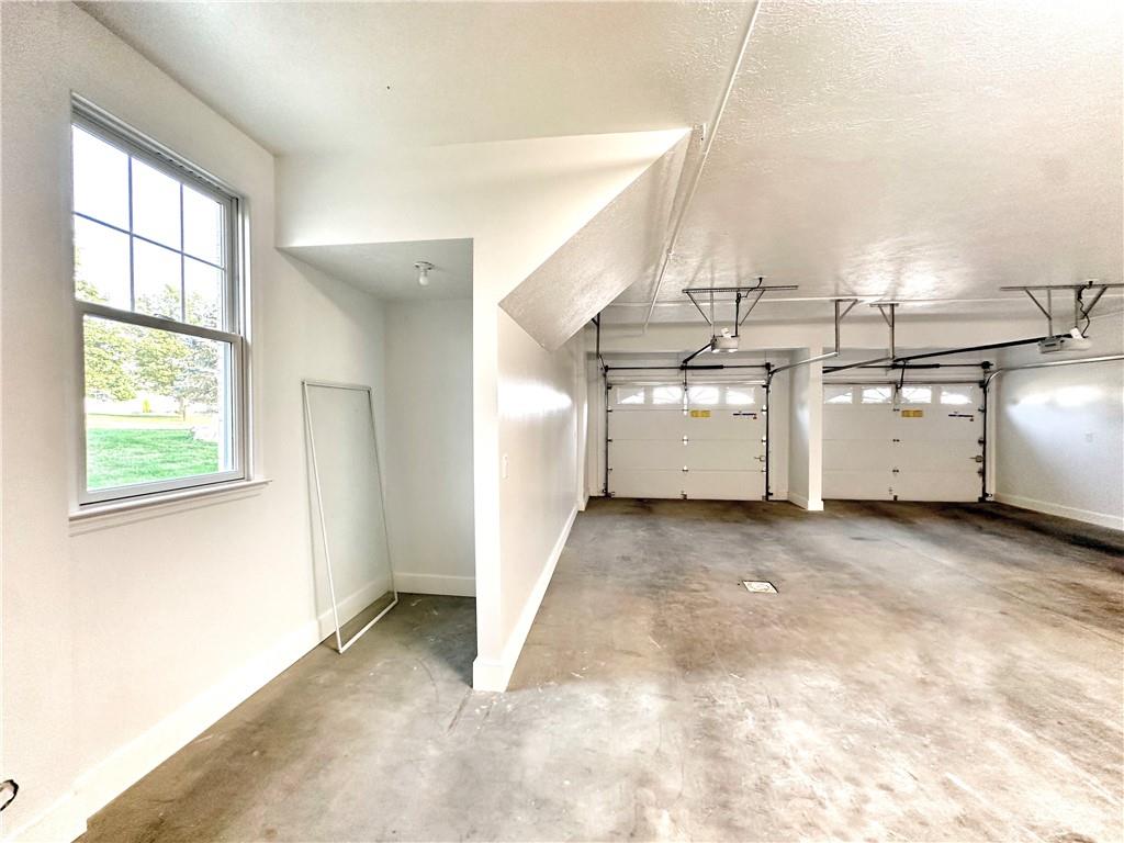 228 Adams Pointe Boulevard, Unit 7 Mars, PA 16046 - Photo 25 of 27 a view of a garage