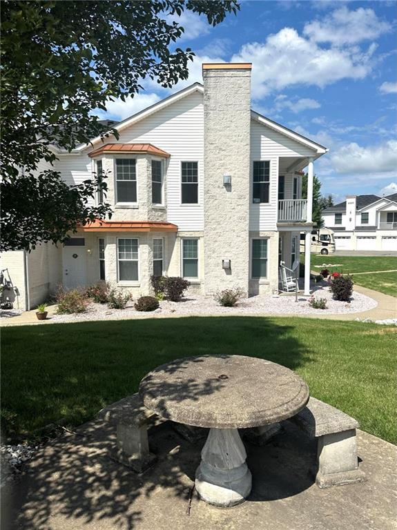 228 Adams Pointe Boulevard, Unit 7 Mars, PA 16046 - Photo 27 of 27 a view of a house with a yard porch and sitting area