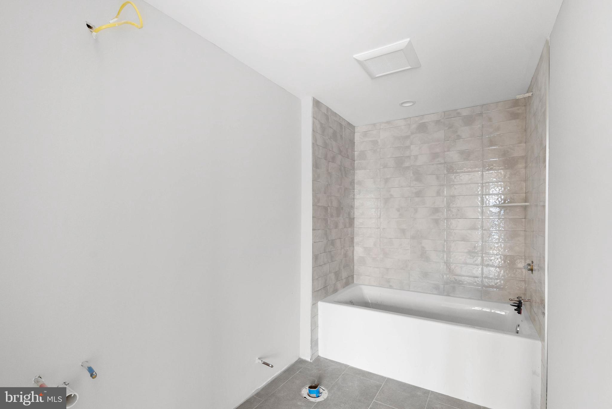 830 Cameron Street Philadelphia, PA 19130 - Photo 4 of 18 a bathroom with a bathtub and a shower