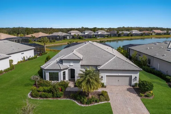 an aerial view of a house with a garden
