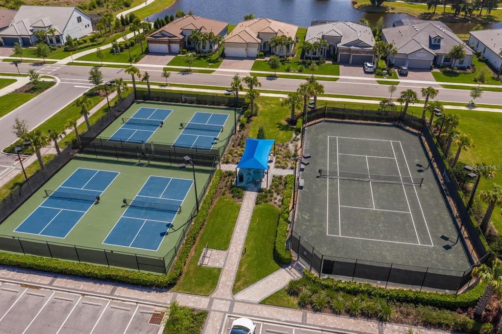 712 Sigsbee Loop Sarasota, FL 34240 - Photo 50 of 59 an aerial view of a house with a yard basket ball court and outdoor seating