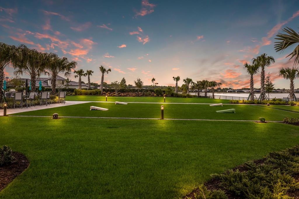 712 Sigsbee Loop Sarasota, FL 34240 - Photo 58 of 59 a view of a golf course with a lake