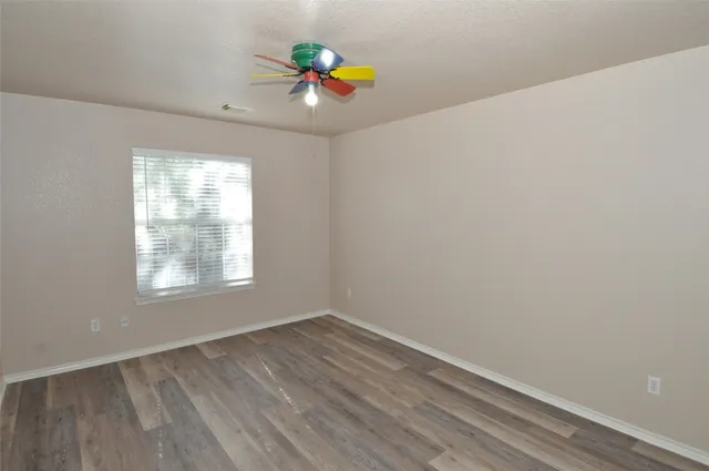 a view of a room with rack on the wall