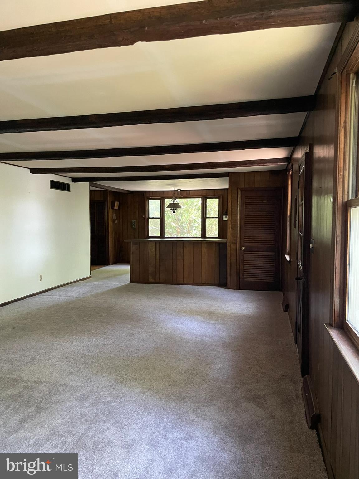 779 Center School Road Perkasie, PA 18944 - Photo 3 of 15 Spacious room with rustic charm and light.