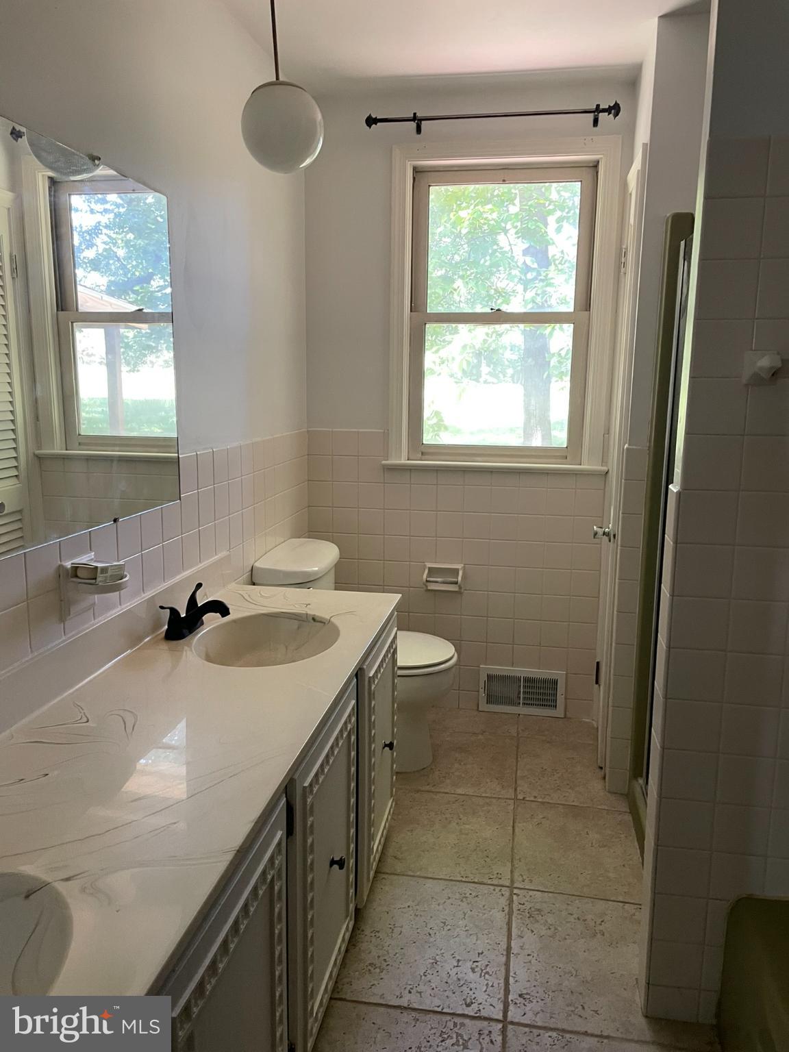 779 Center School Road Perkasie, PA 18944 - Photo 4 of 15 Bright and airy bathroom with natural light.
