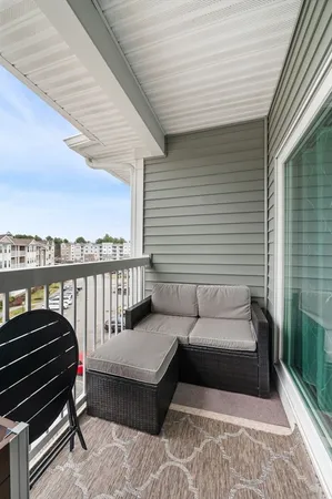 a balcony with furniture