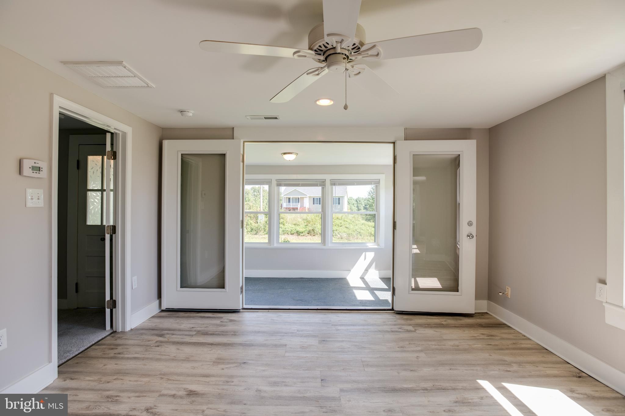 9220 White Shop Road Culpeper, VA 22701 - Photo 5 of 31 Family Room open to the Sunroom
