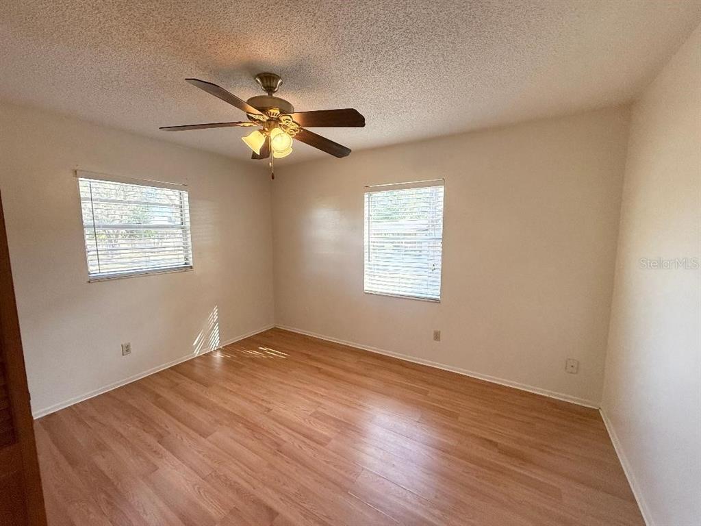 4105 Robinson Road Valrico, FL 33594 - Photo 51 of 58 a view of empty room with wooden floor
