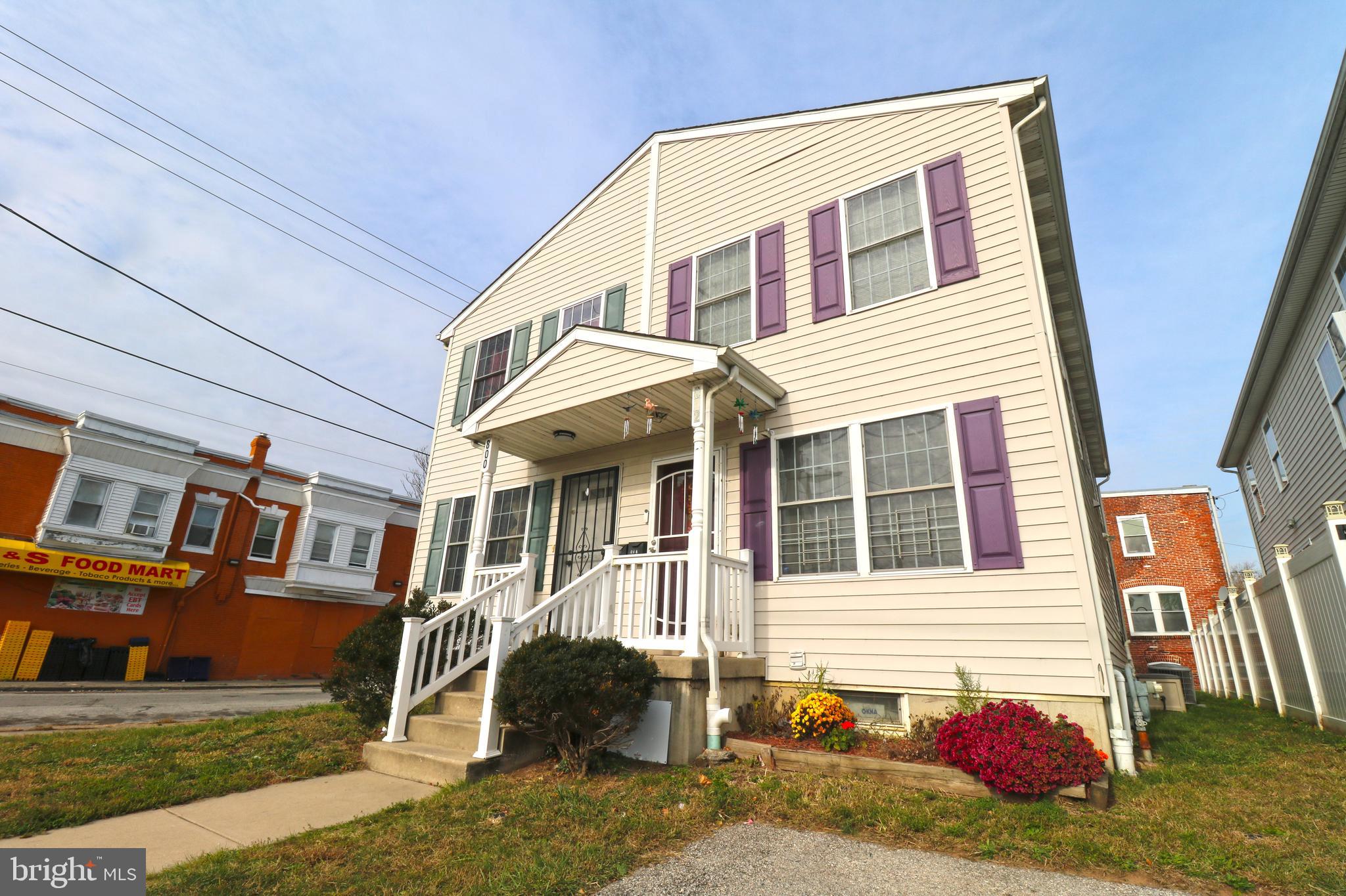 802 9th Street Chester, PA 19013 - Photo 4 of 43 a front view of a house with a yard