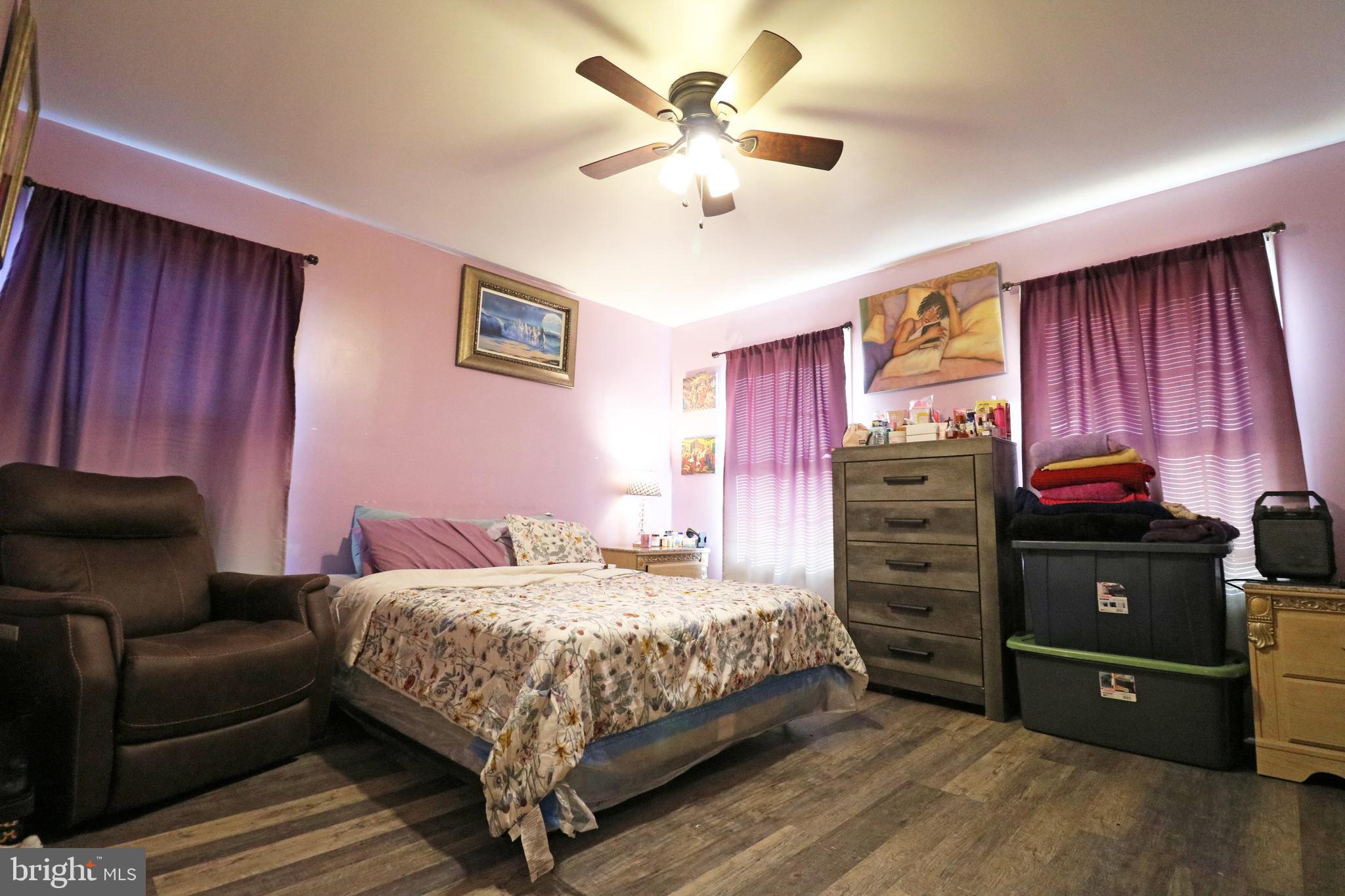 802 9th Street Chester, PA 19013 - Photo 43 of 43 a bedroom with a bed and a couch