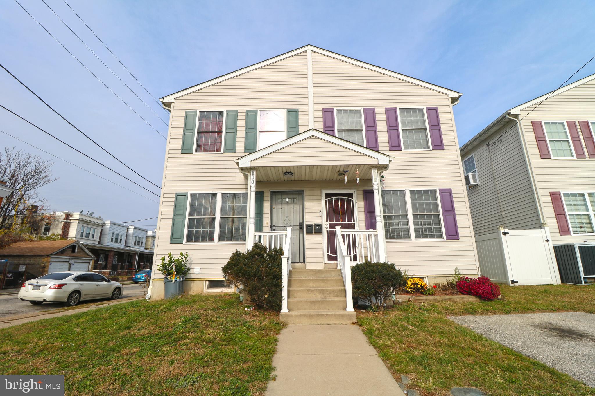 802 9th Street Chester, PA 19013 - Photo 5 of 43 a front view of a house with a yard