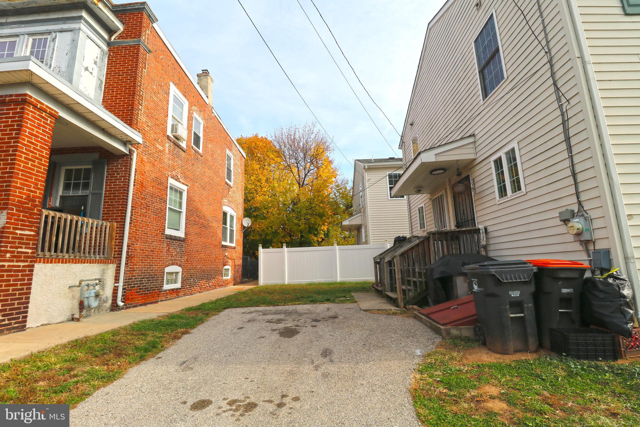 802 9th Street Chester, PA 19013 - Photo 7 of 43 a view of a house with a backyard