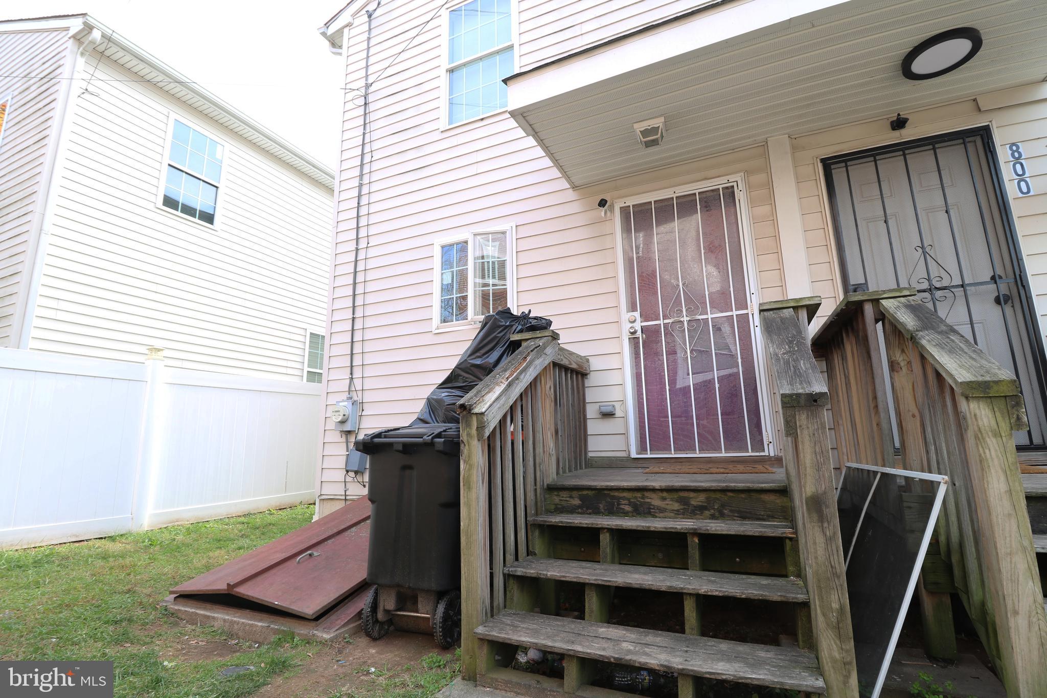 802 9th Street Chester, PA 19013 - Photo 8 of 43 a view of a house with a door