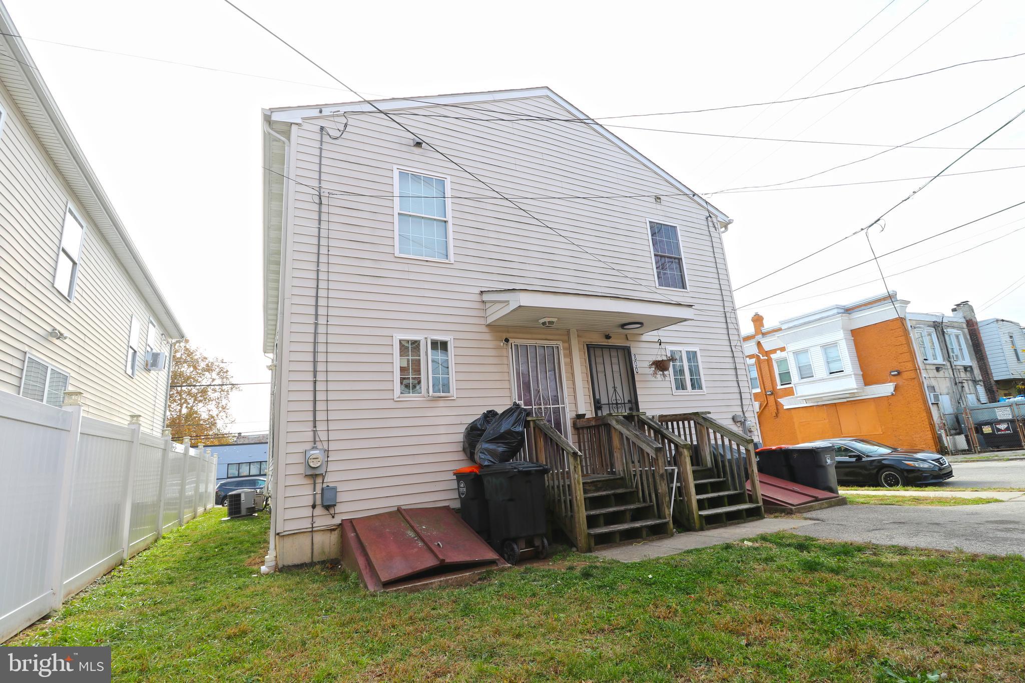 802 9th Street Chester, PA 19013 - Photo 9 of 43 a view of a house with a patio and a slide