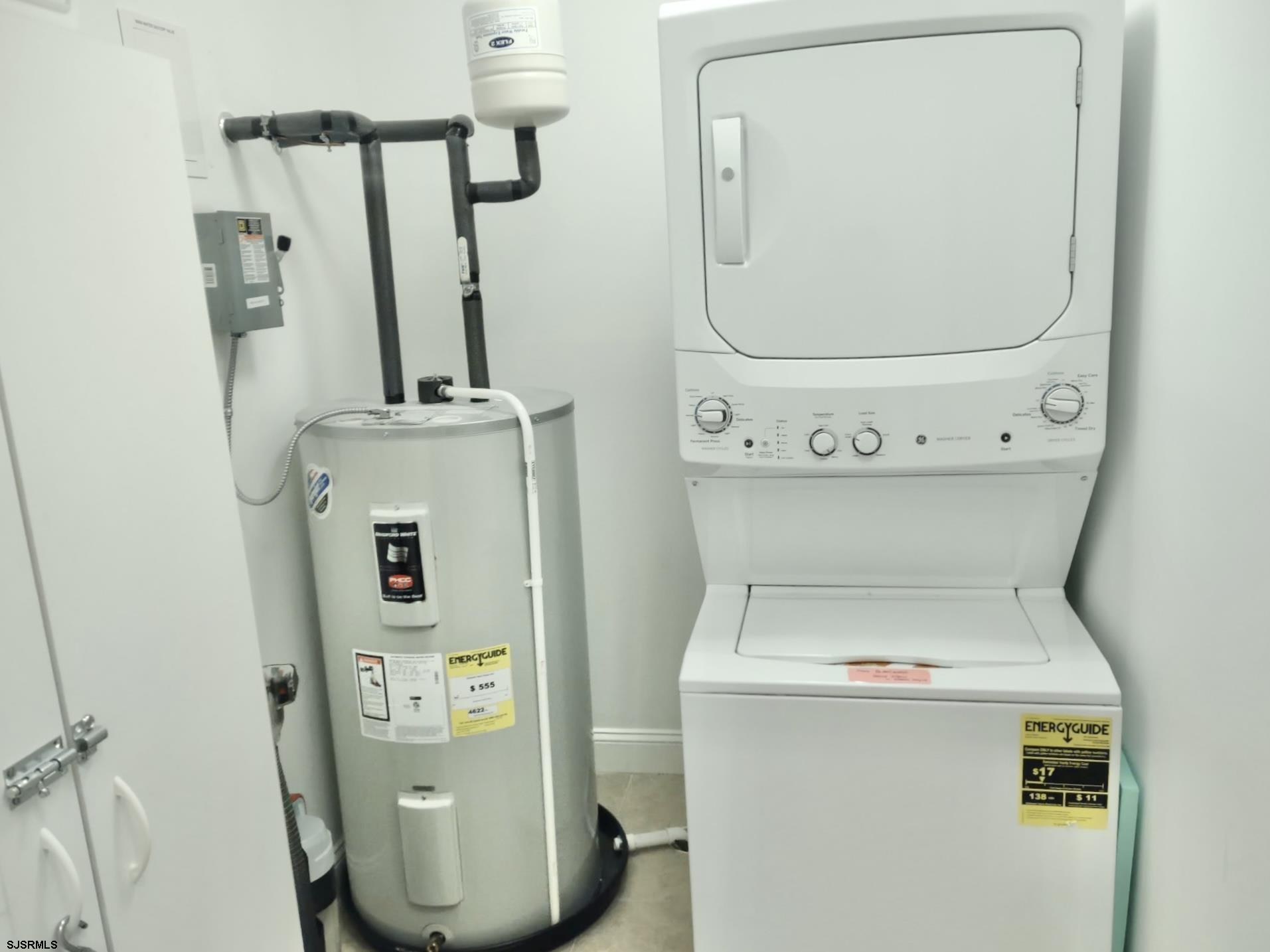 810 Asbury Avenue, Unit 303 Ocean City, NJ 08226 - Photo 13 of 20 a utility room with dryer and washer