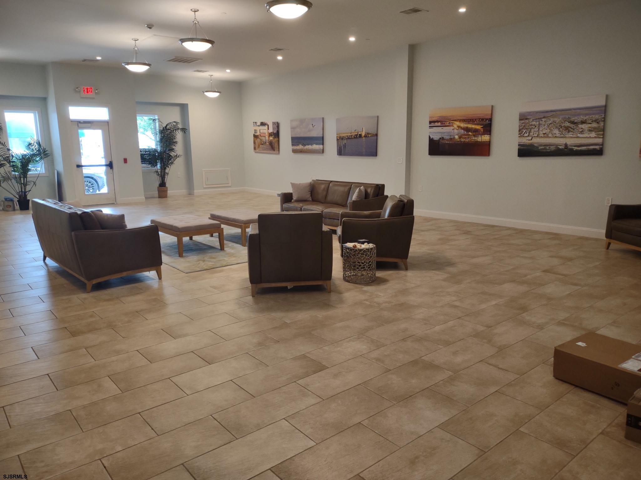810 Asbury Avenue, Unit 303 Ocean City, NJ 08226 - Photo 15 of 20 a living room with furniture
