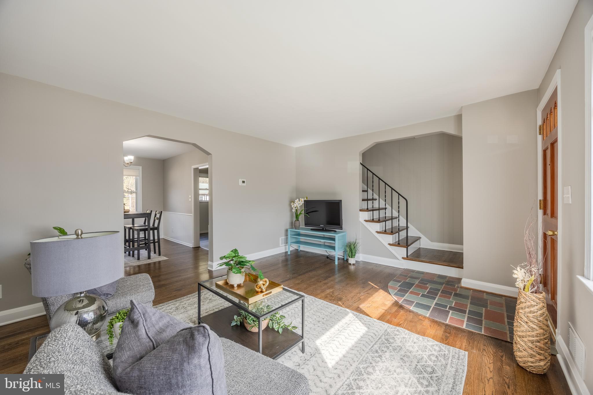 6118 Mt Ridge Road Catonsville, MD 21228 - Photo 6 of 48 a living room with furniture and a wooden floor