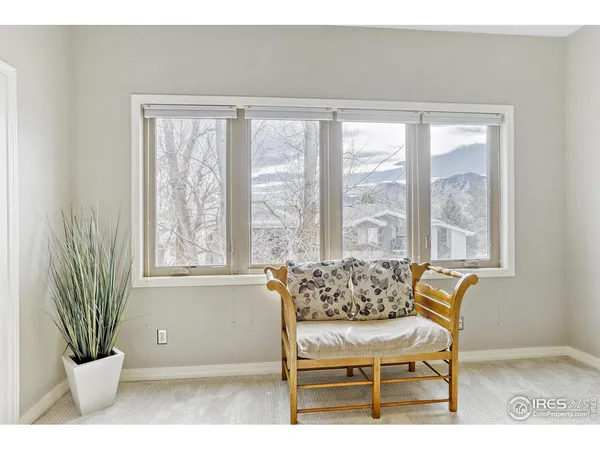 a view of a chair and table in a room