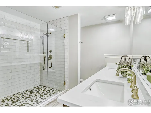 a bathroom with a bathtub and shower