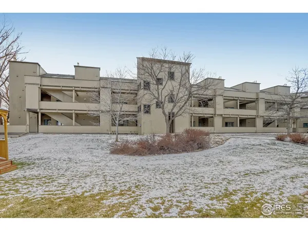 a large building with a view of a yard