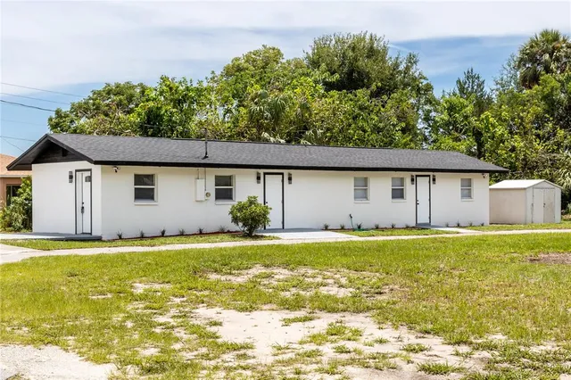 a view of a house with a swimming pool