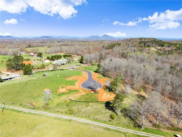 a view of a swimming pool with an outdoor space and seating area