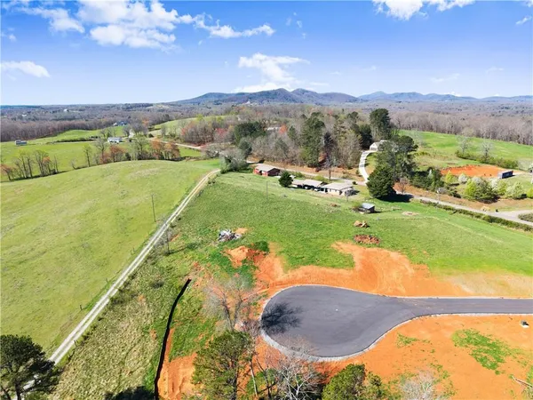 a view of a road with a yard