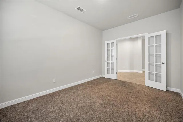 an empty room with a door