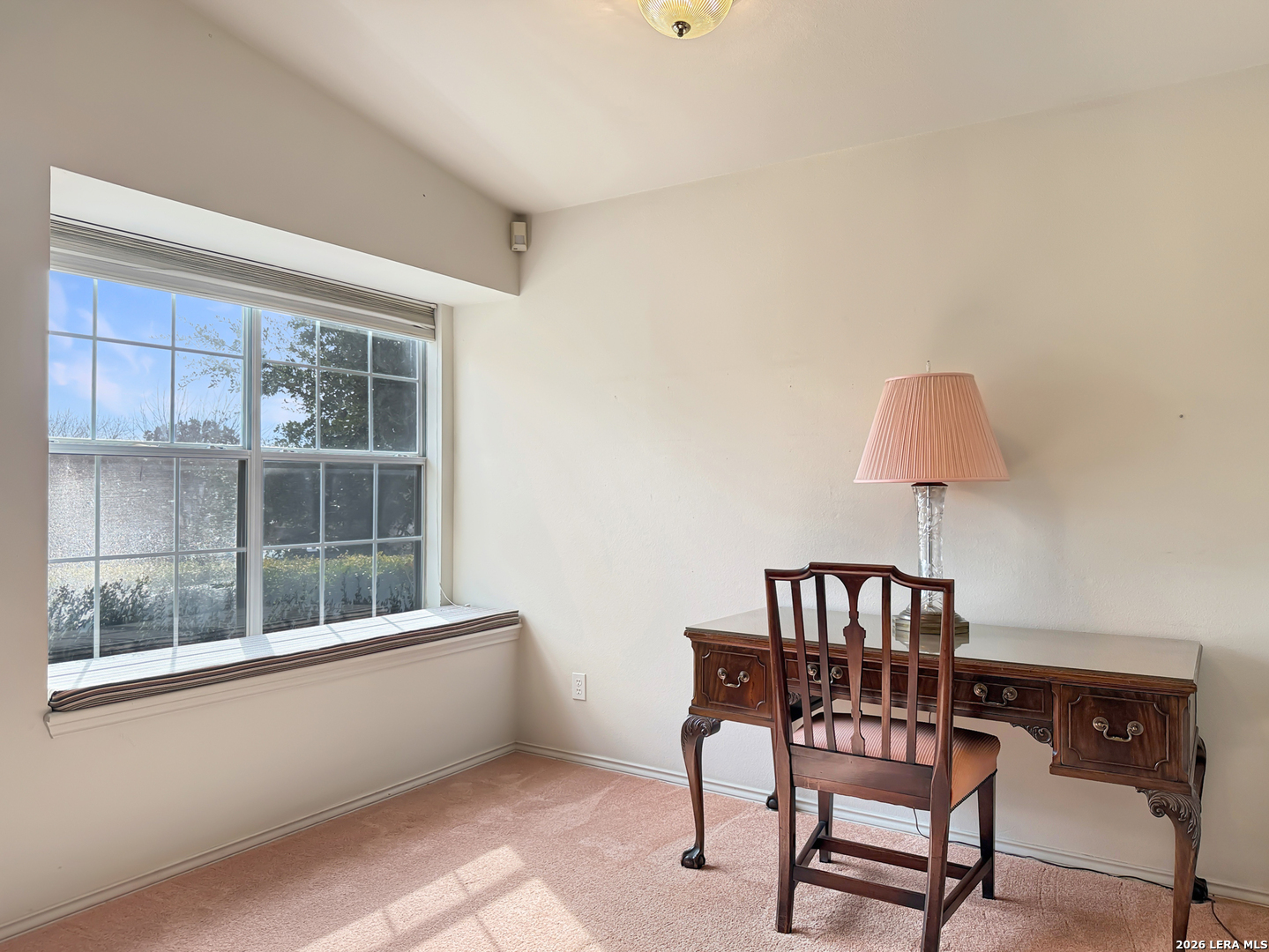 140 St Andrews Loop Kerrville, TX 78028 - Photo 11 of 24 a living room with furniture and a window