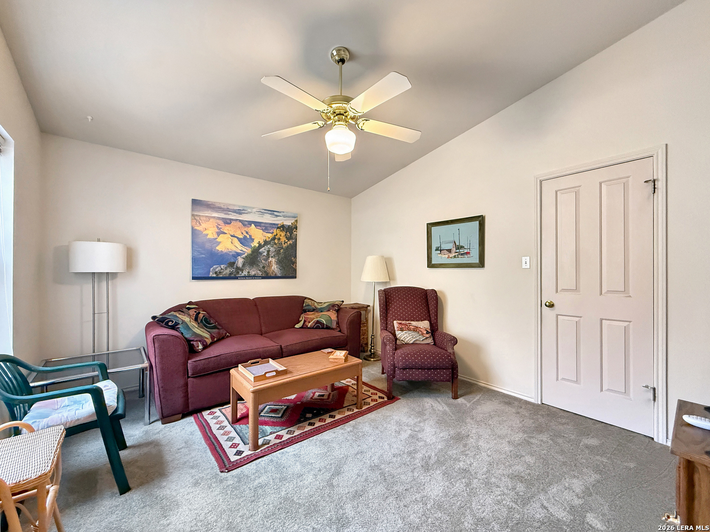 140 St Andrews Loop Kerrville, TX 78028 - Photo 17 of 24 a living room with furniture and a ceiling fan