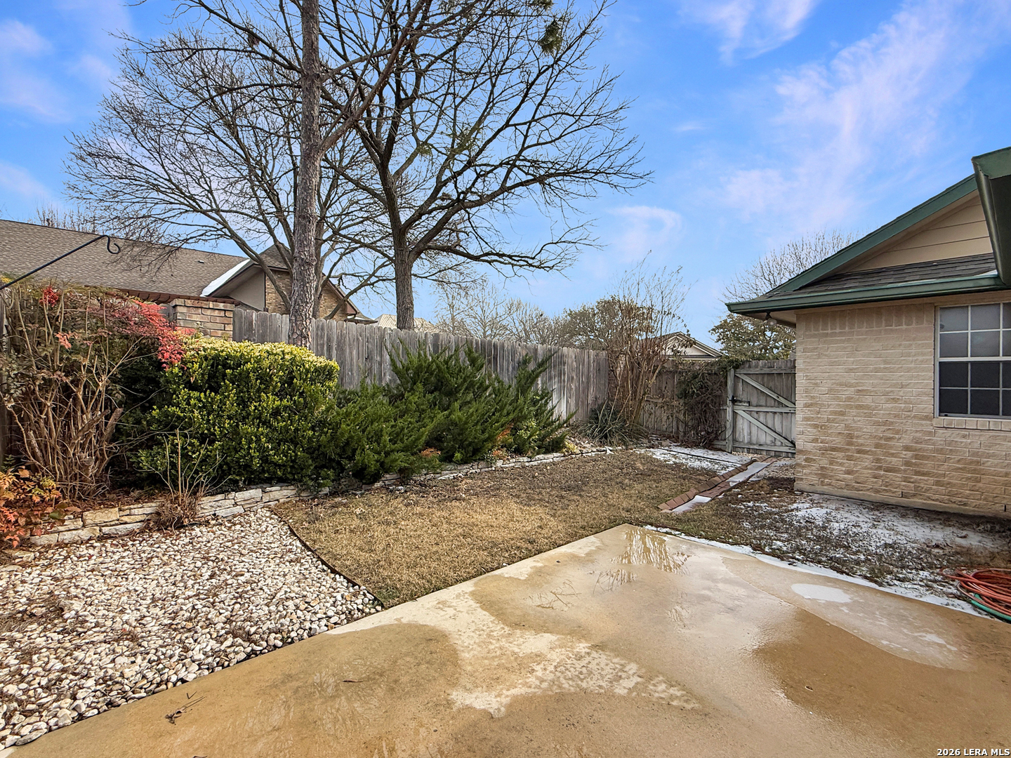 140 St Andrews Loop Kerrville, TX 78028 - Photo 21 of 24 a view of a backyard with large trees