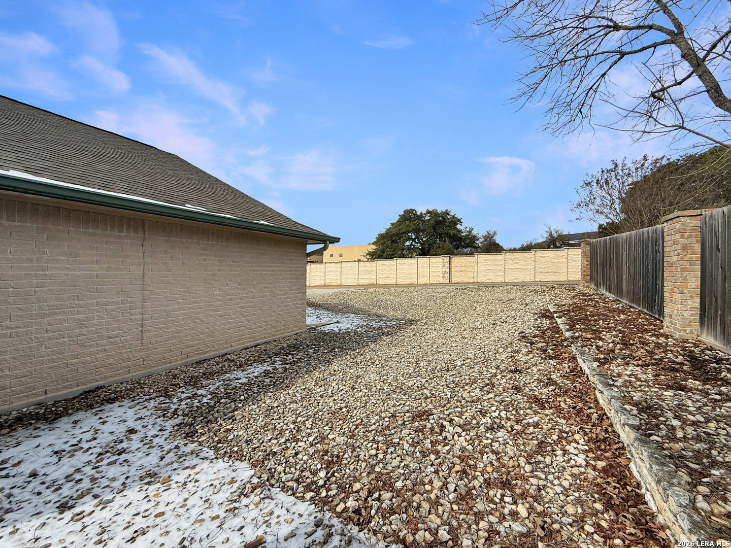 140 St Andrews Loop Kerrville, TX 78028 - Photo 22 of 24 a view of empty room with wooden fence