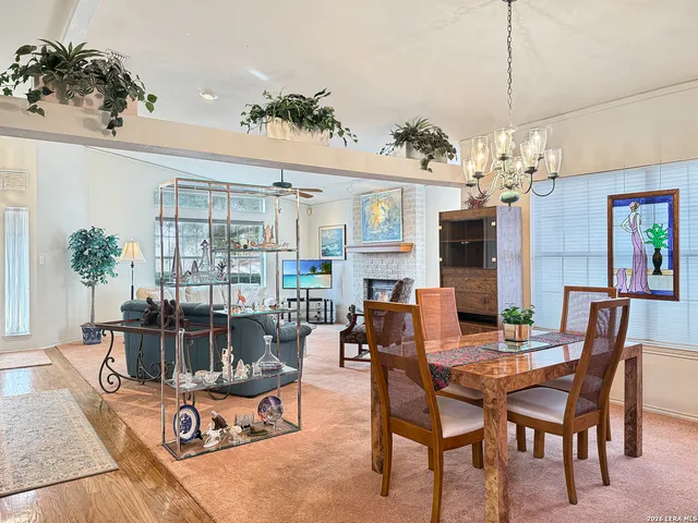 a kitchen with a refrigerator sink and cabinets